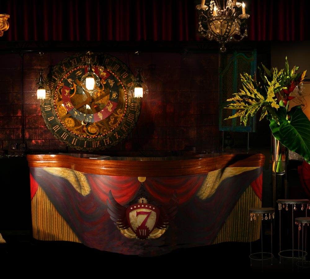 Draped alcove with layered silks and lamplight